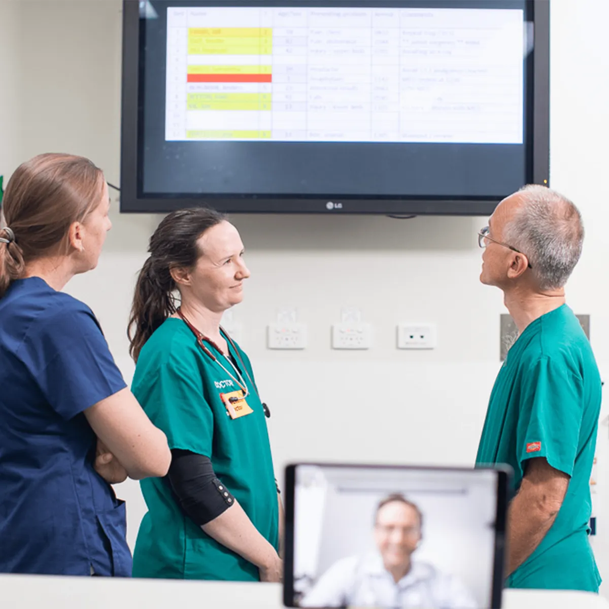 Healthcare team reviewing patient data